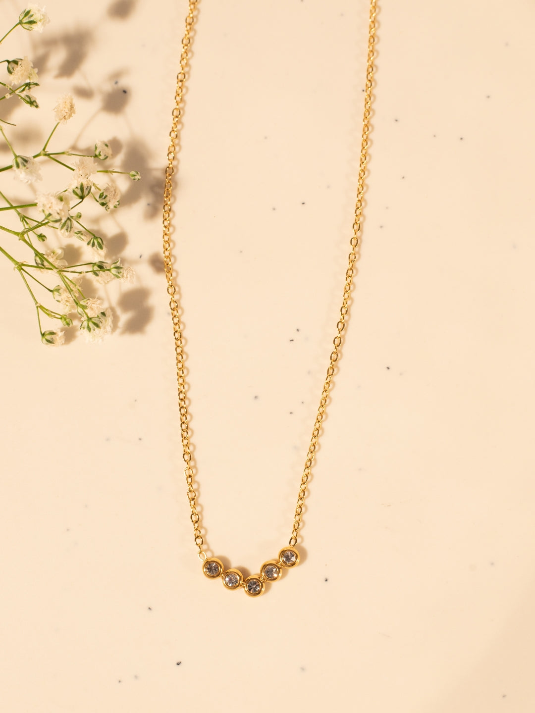 V Studded Pendant Necklace – Gold Plated Stainless Steel, Premium AD Stones, Adjustable Length