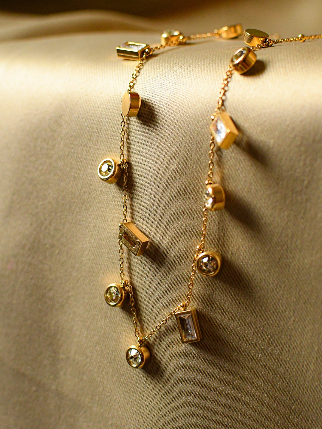 Golden Studded Charms Necklace – 18K Gold, Cubic Zirconia