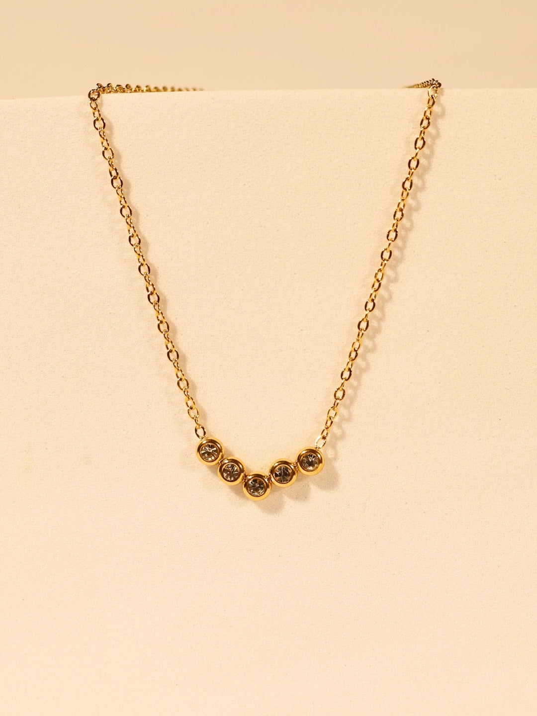 V Studded Pendant Necklace – Gold Plated Stainless Steel, Premium AD Stones, Adjustable Length